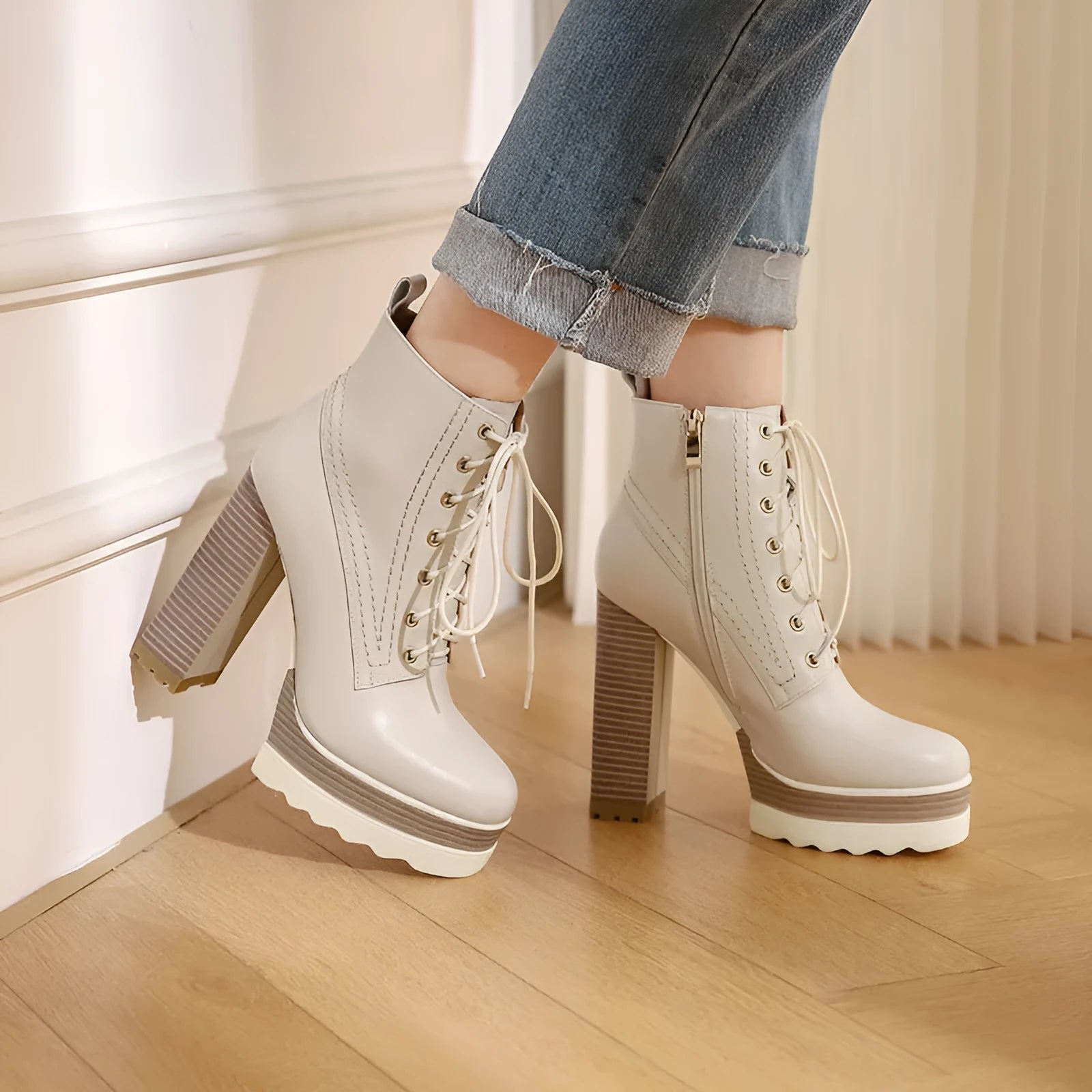 Women's black chunky heel waterproof platform ankle boots with side zip on a white background
