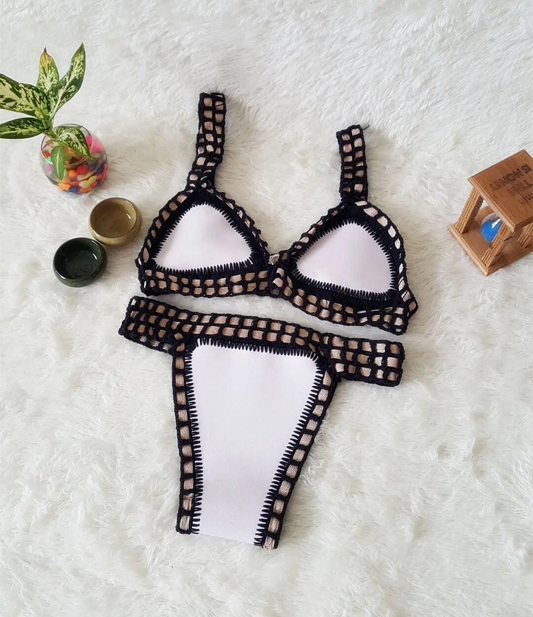Hand crochet colourful bikini set with lace trim and rubber straps in multiple colours on white background
