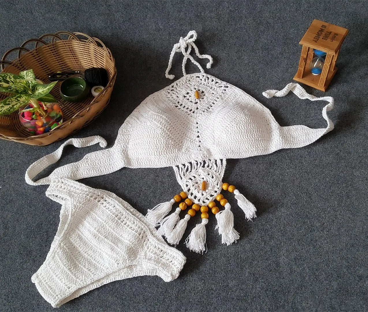Women's crochet tassel bikini set in black, khaki, and white with tassel details, beachwear