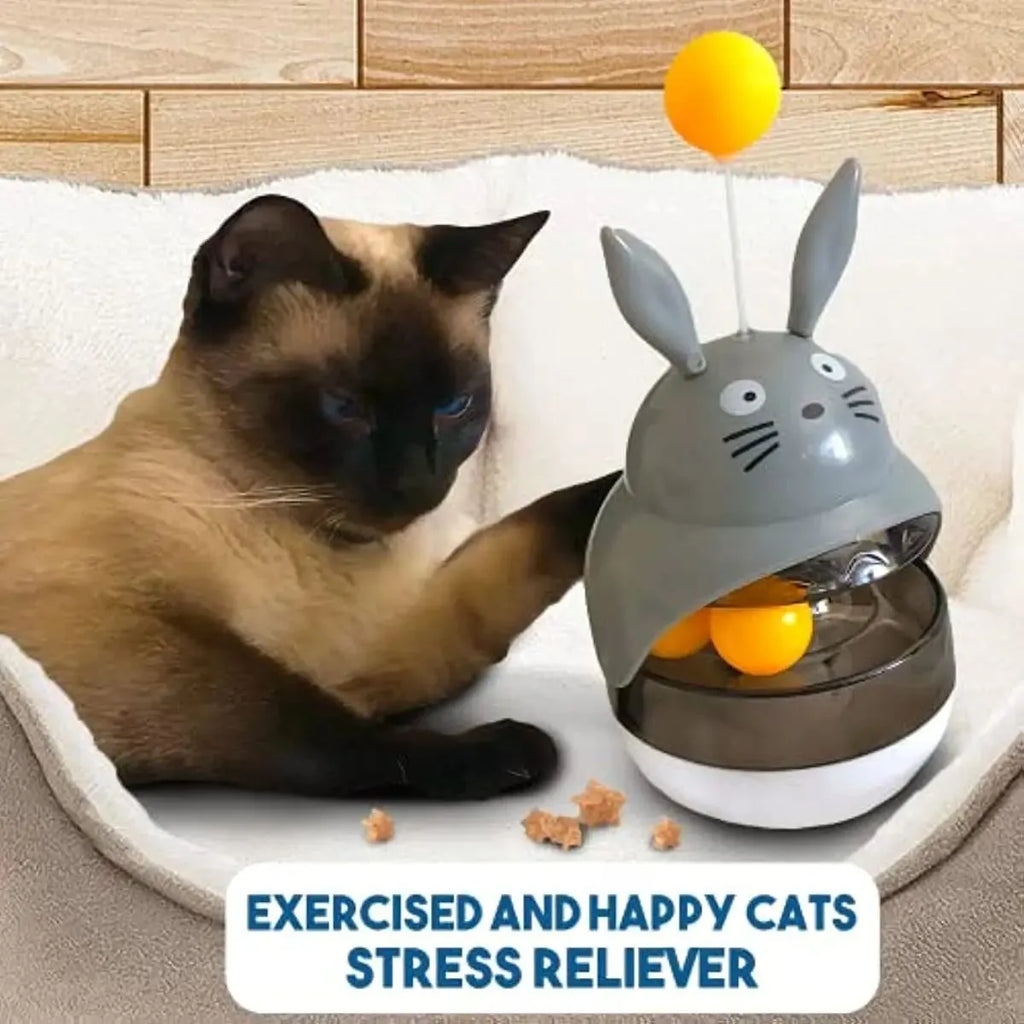 Interactive cat feeder toy treat dispenser with sounding bell in brown colour for indoor cat exercise