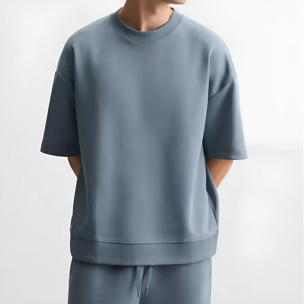 Double-sided cloth texture loose short sleeve top and matching shorts co-ord set on a hanger.