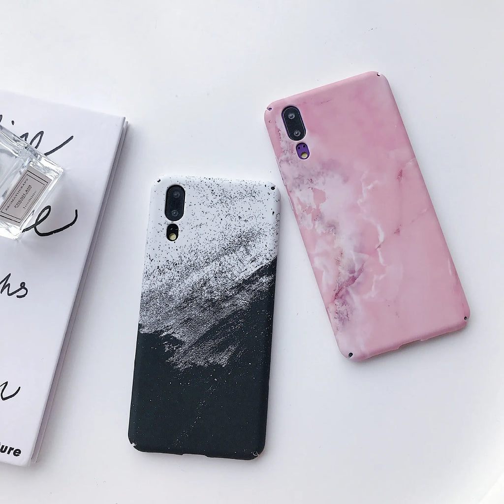 Painted pure colour black and pink phone back cover cases for Huawei models on a white background.