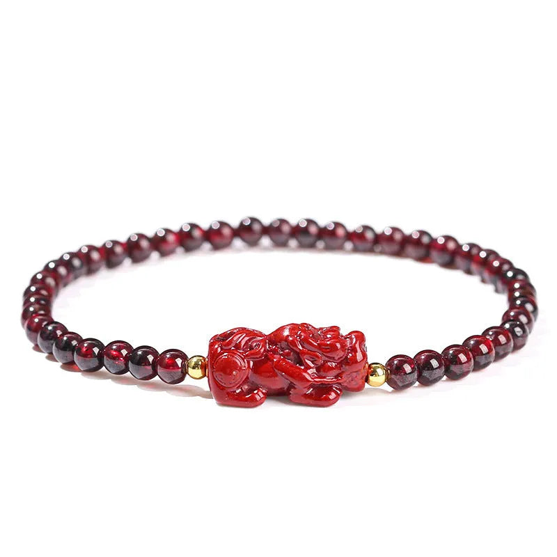 Women's garnet bracelet with purple sand pixiu carving and strawberry quartz square beads