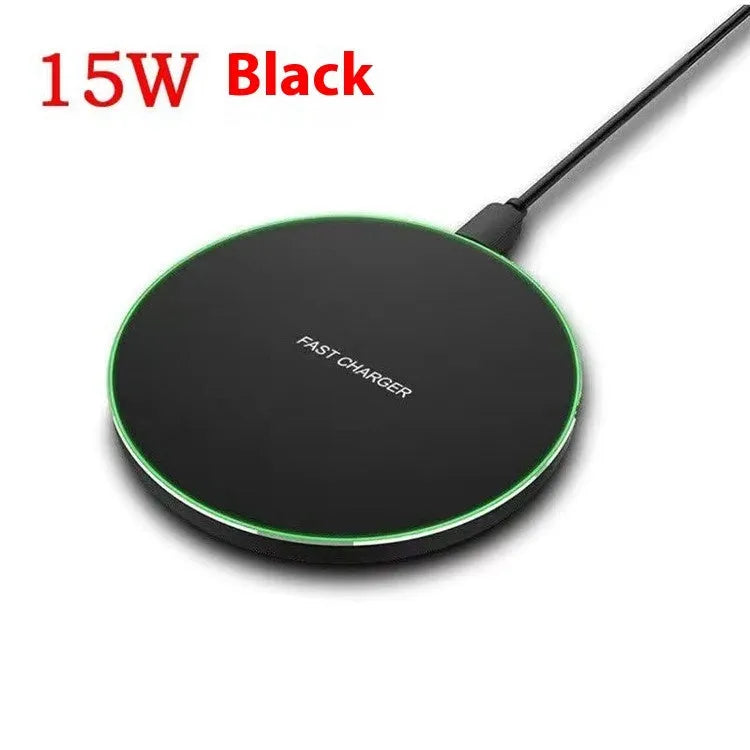 Black 15W fast wireless charger pad with type C cable on a desk