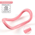 Yoga four piece fitness set with leg stretcher, yoga ring, pedal device, and figure eight tension rope on a plain background