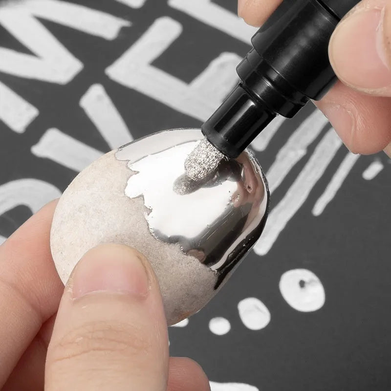 Black waterproof mirror marker pen with plastic body for writing on glass and windows.