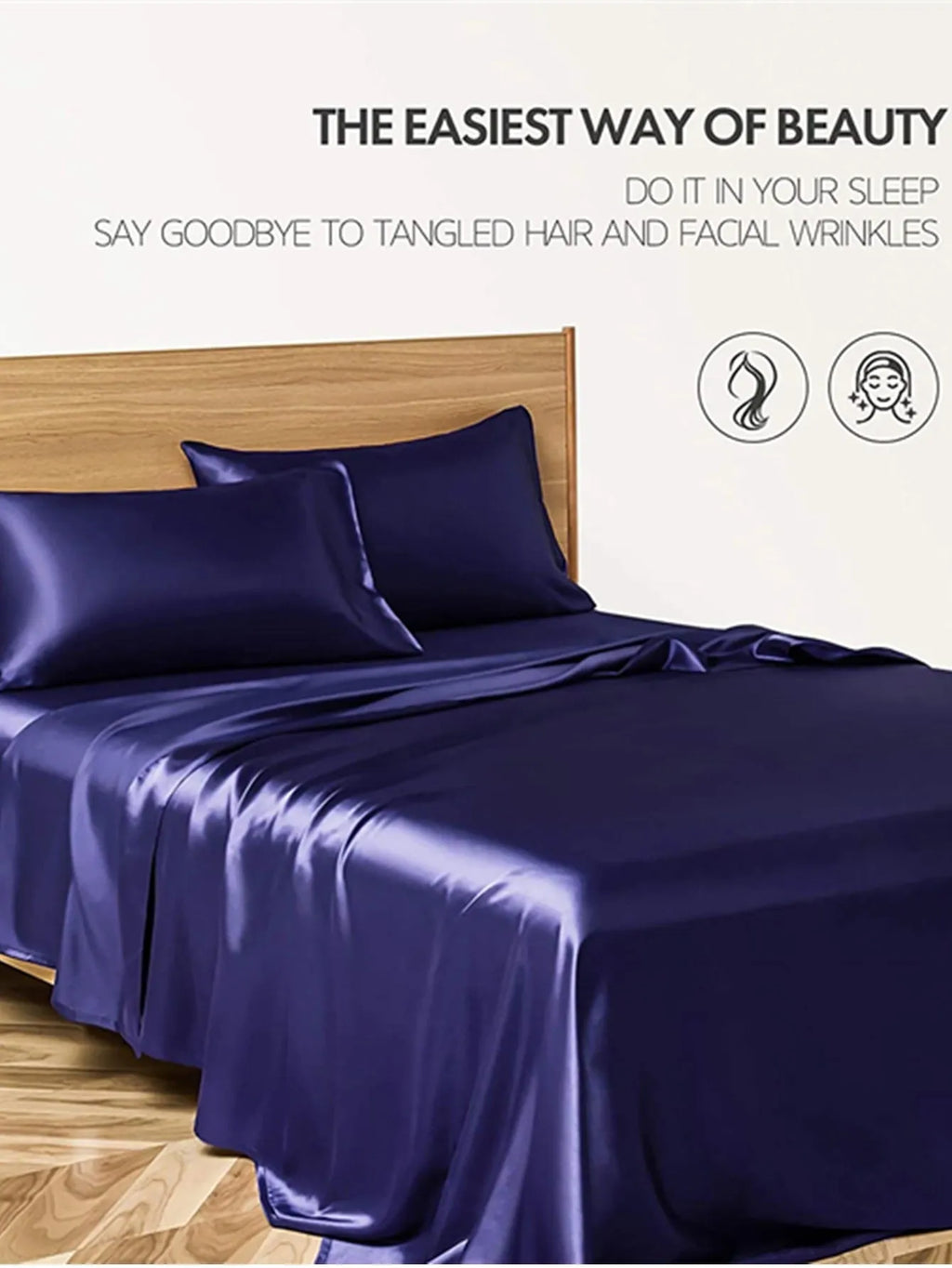 Four-piece imitation silk bedding set with satin weave in Navy Blue on a bed