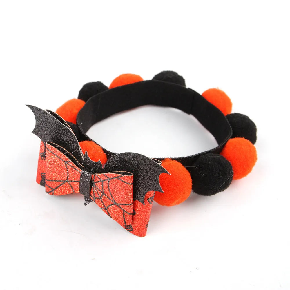 Halloween pet collar with fur ball decoration in pumpkin, pirate, skull, and witch colour designs