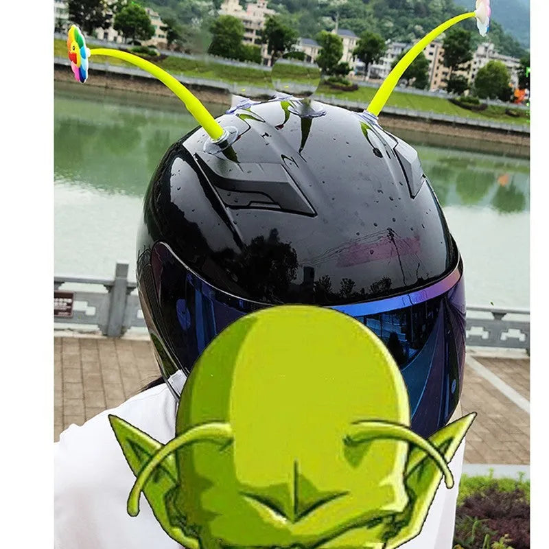 Yellow silicone sunflower decoration with a clear suction cup for helmet attachment.