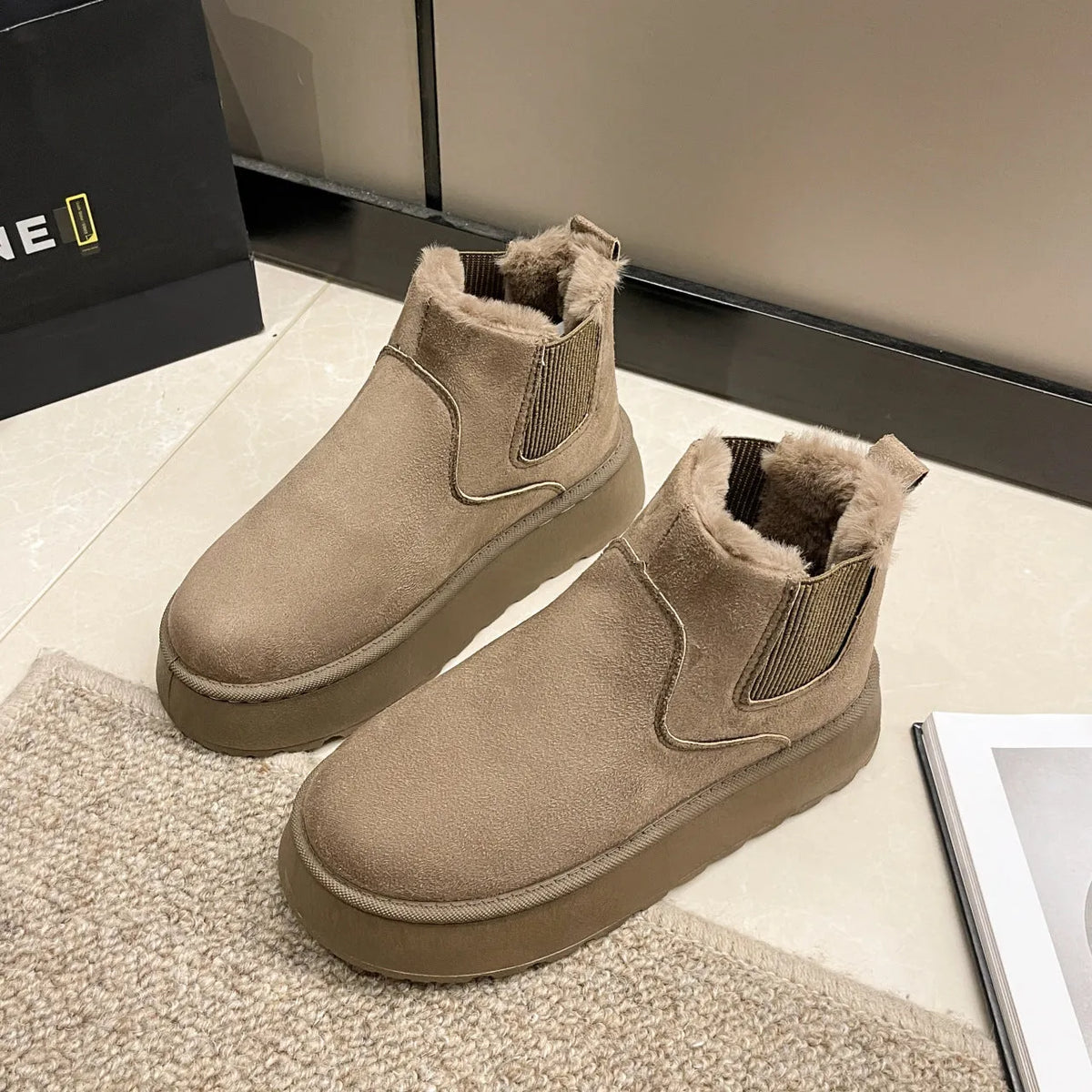 Women's plush snow boots in milky white with flat heel, round toe, faux PU upper, and short plush lining