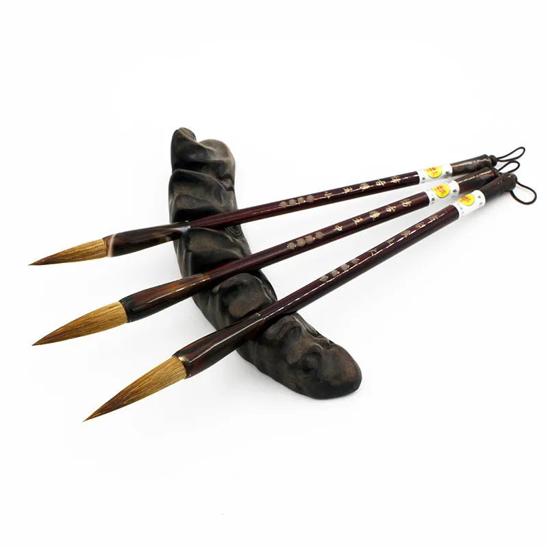 Wolf Hao traditional Chinese calligraphy brush with wolf hair nib and steel shaft, shown in multiple sizes.