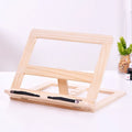 Large wooden book easel with iron clip, pine wood, 31 x 24 cm, holding an open book