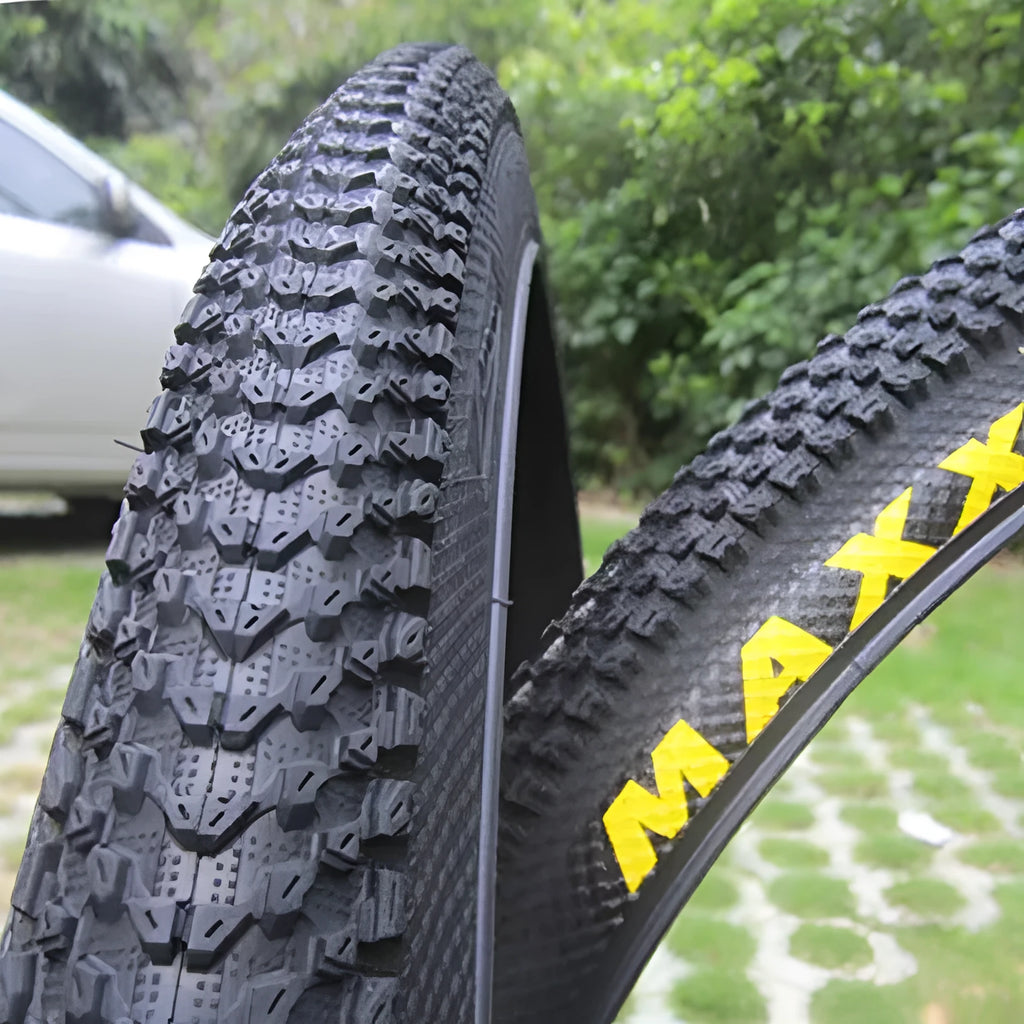 Ultralight puncture proof mountain bike tyre shown in multiple sizes for 26, 27.5 and 29 inch wheels.