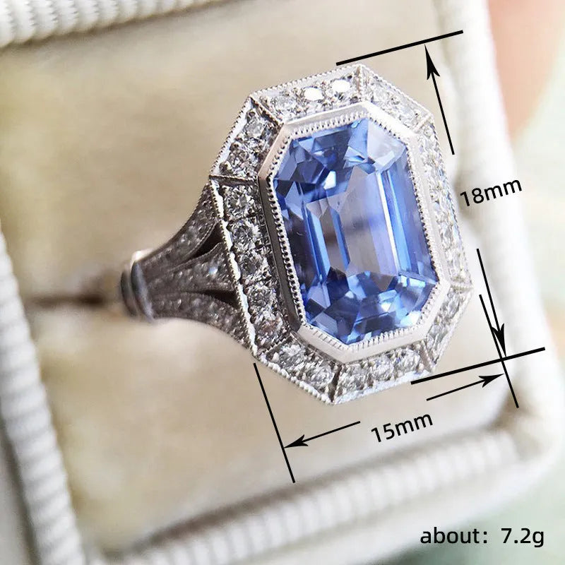 Fashion long hexagonal blue metal women's ring made of copper with electroplated finish, front view