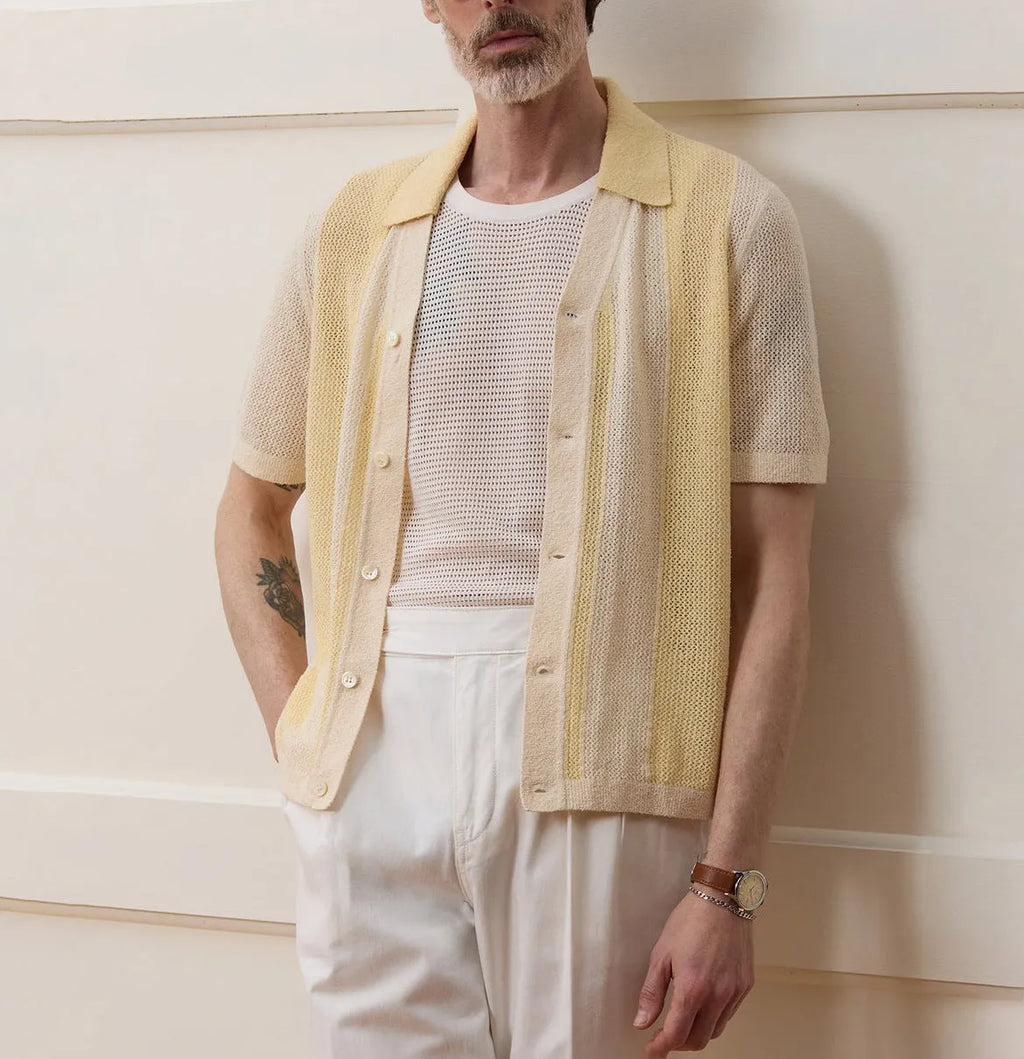 Yellow casual polo shirt with hollow-out design and asymmetric cut, short sleeves, made from Tencel fabric.