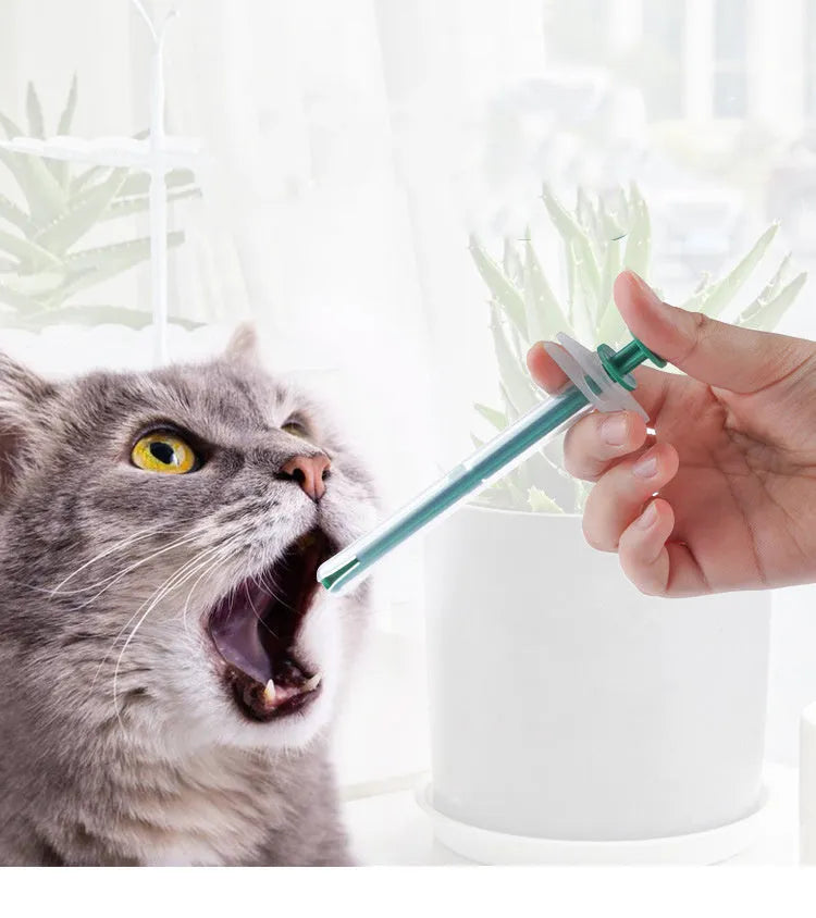 Two pet pill shooter tools with soft silicone tips for medicine feeding to cats and dogs