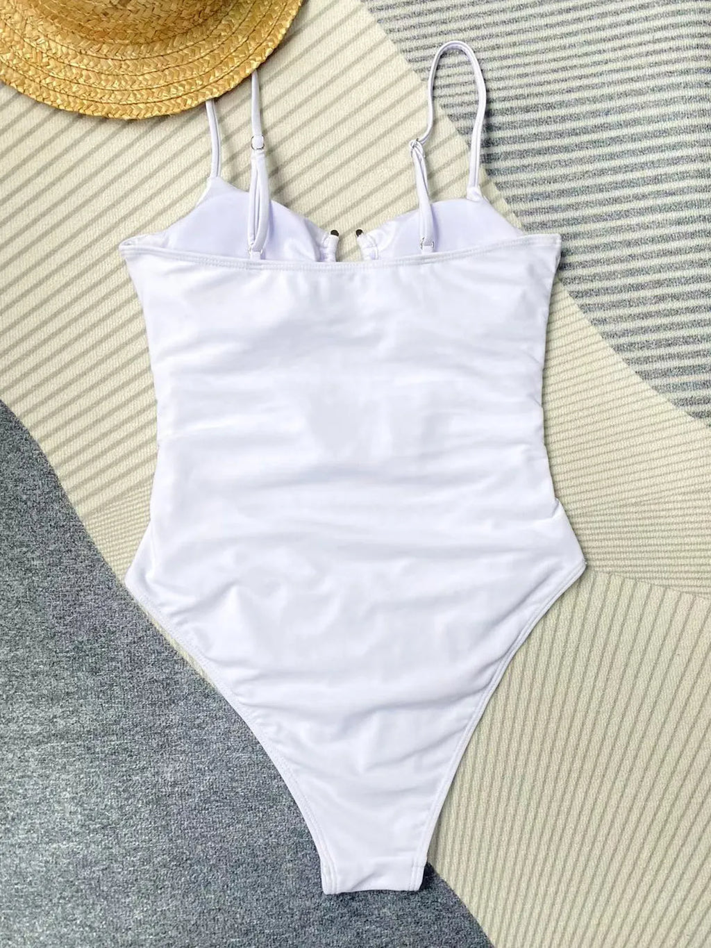 Black women's one-piece bikini-style swimsuit on a mannequin