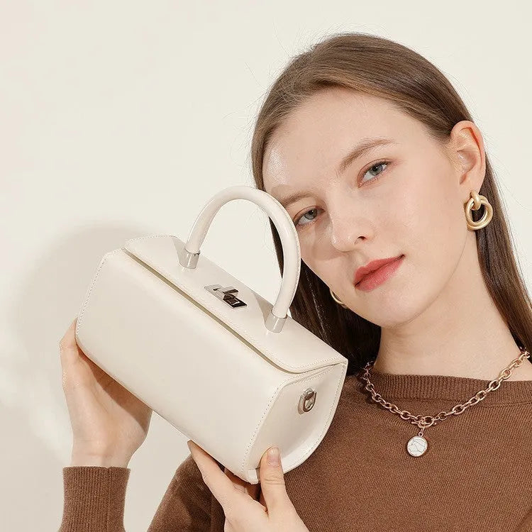 Leather women's crossbody bag with clamshell design in urban simplicity style