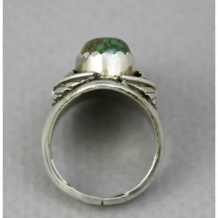 Women's geometric turquoise ring with electroplated alloy construction on finger