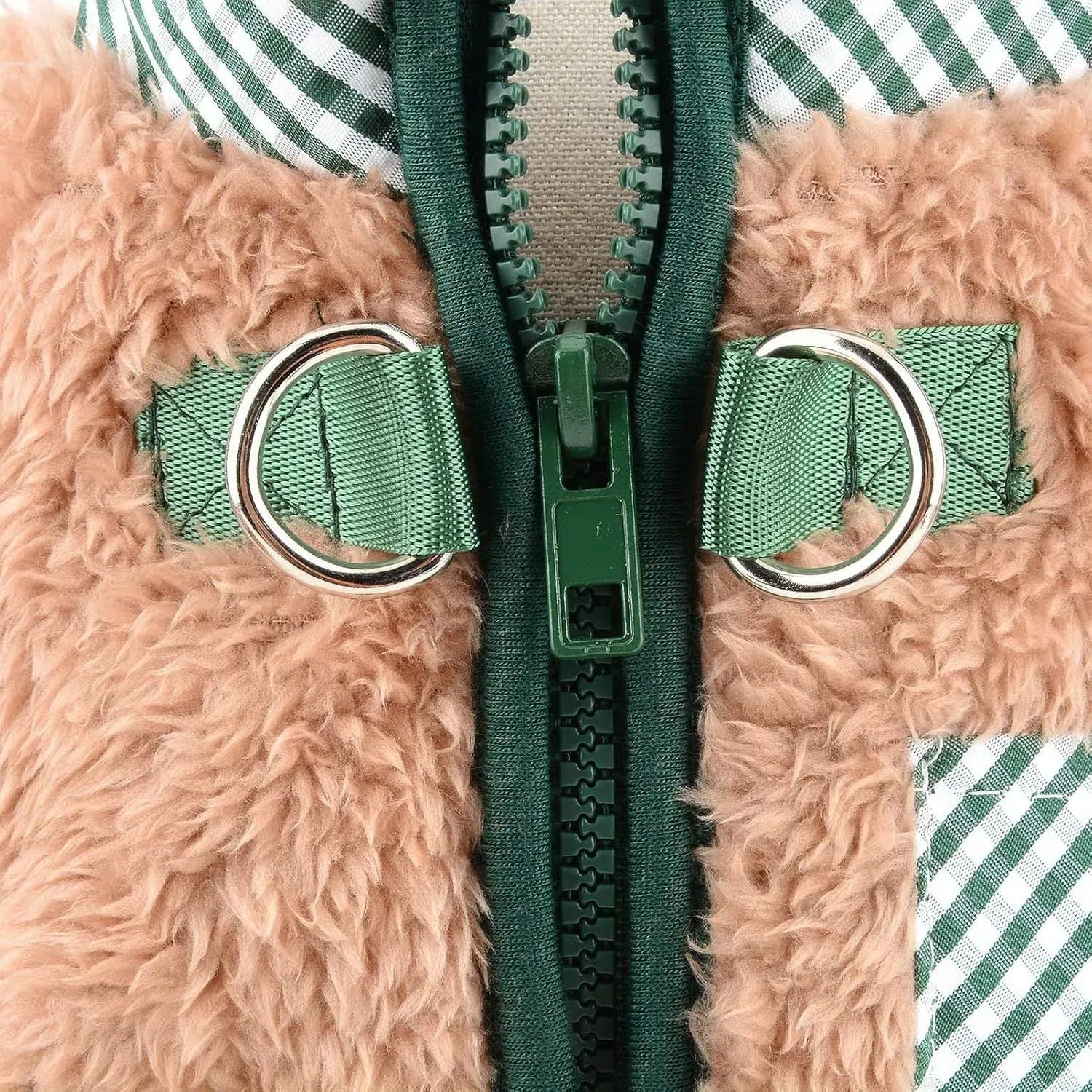 Green plush fleece dog coat with four legs and a back zipper on a small dog.
