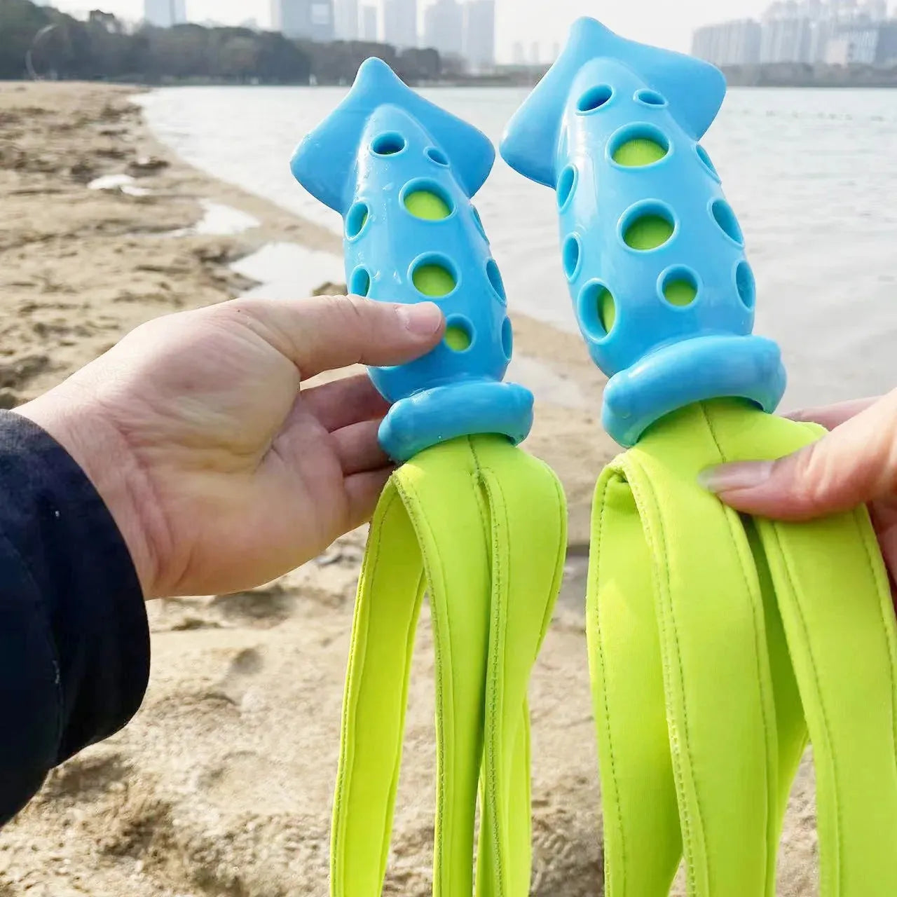Blue squid-shaped dog chew toy with rubber tentacles and waterproof cloth elements measuring approximately 39cm