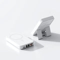 Magnetic wireless power bank with bracket in white, showing 10000mAh capacity and USB port, on a desk