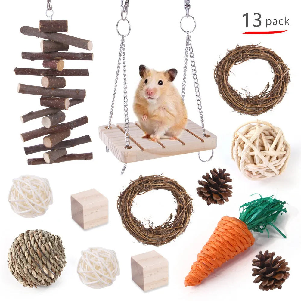 Assortment of wooden chew toys and natural fibre balls and mats for small pets like rabbits and parrots