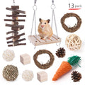 Assortment of wooden chew toys and natural fibre balls and mats for small pets like rabbits and parrots