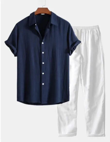 A navy blue casual short sleeve suit with trousers, shown with glasses, shoes, and a watch on a mannequin.