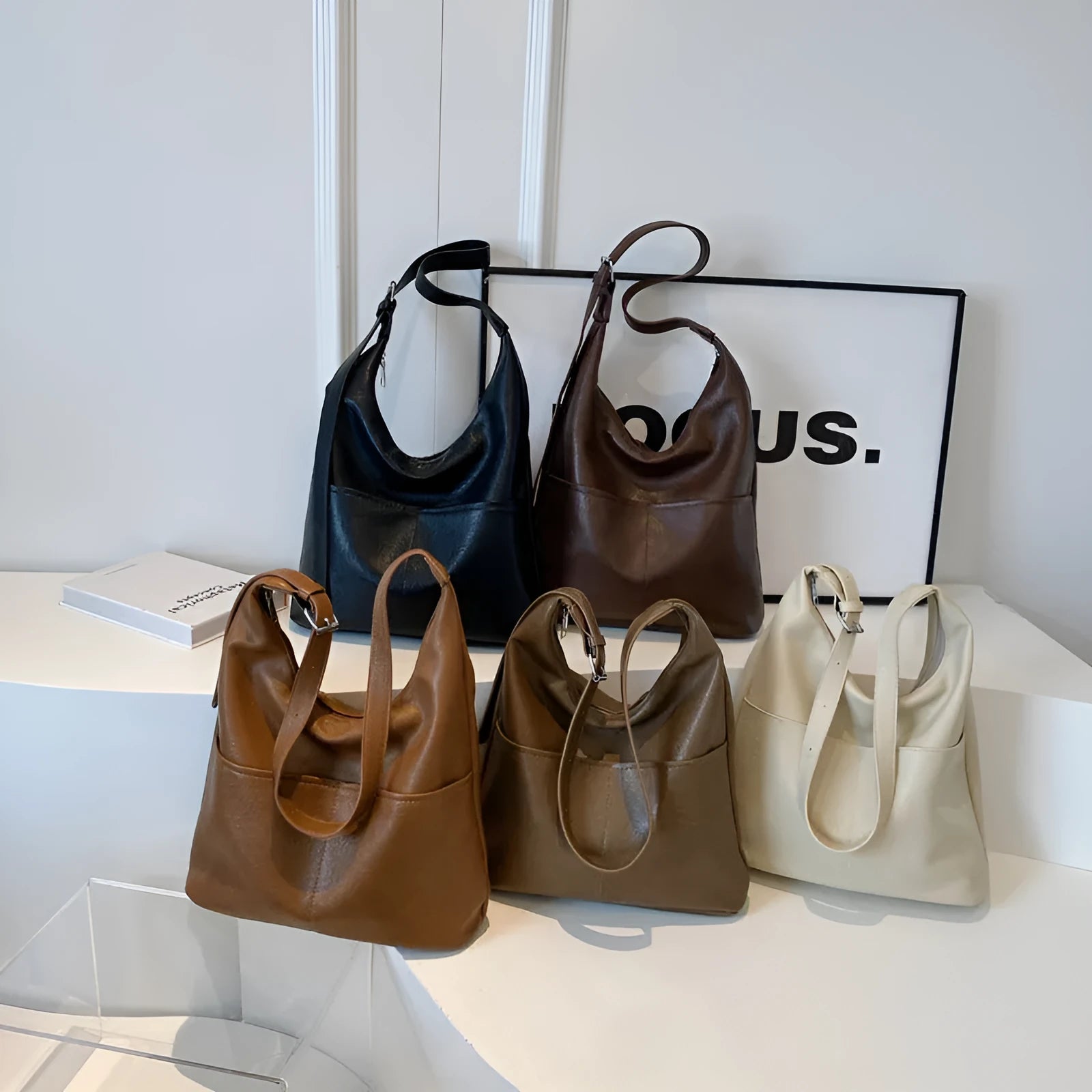 Women's large-capacity shoulder bag in soft PVC with bucket shape and stitching detail, available in black, coffee, brown, mud, beige