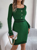 Women's long sleeve organic cotton sweater dress with lantern sleeves and a mid-length hip skirt.