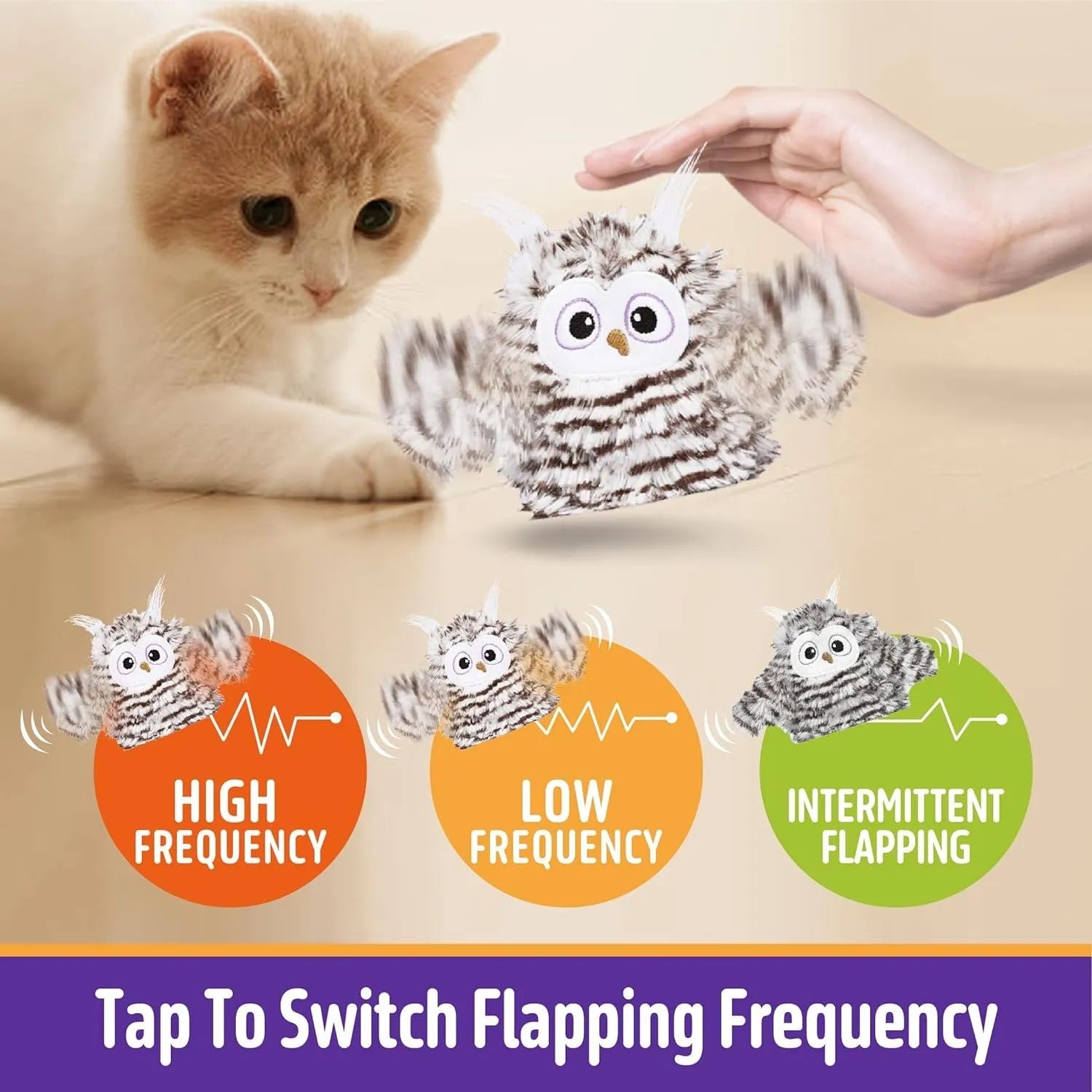 Grey automatic chirping owl cat toy with flapping wings on a flat surface.