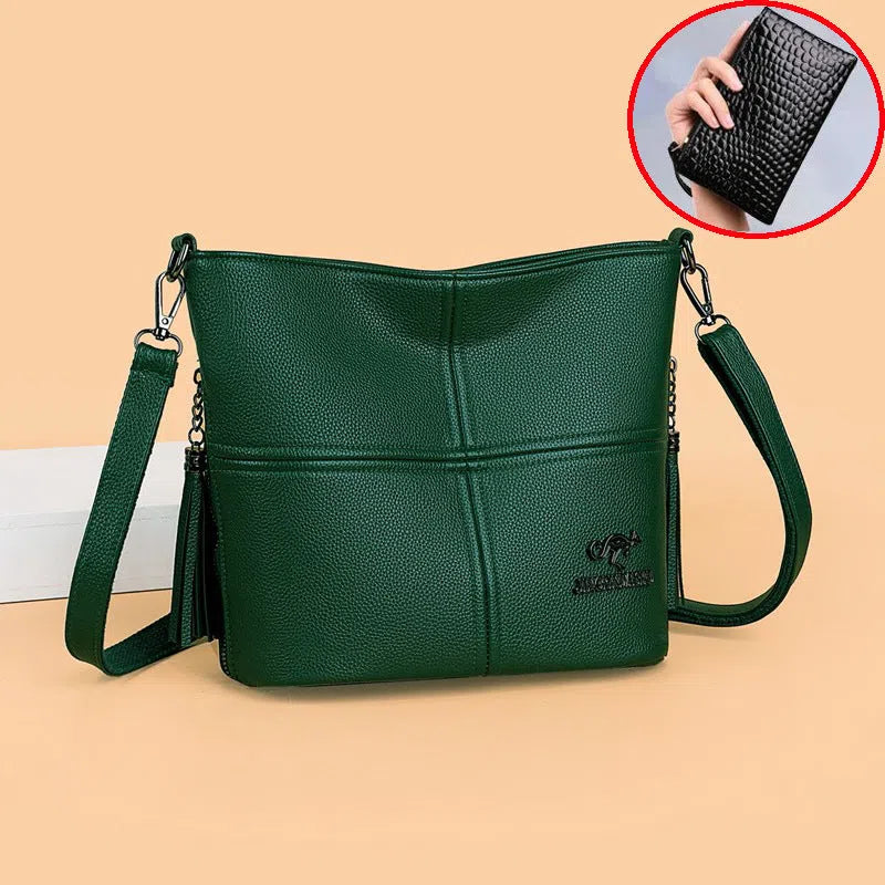 PU crossbody bag in red with stitching and tassels, horizontal shape, large capacity