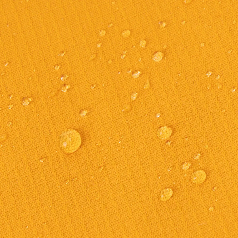 Waterproof dog raincoat in camouflage colour with two leg openings for chest and back coverage, polyester material, casual style
