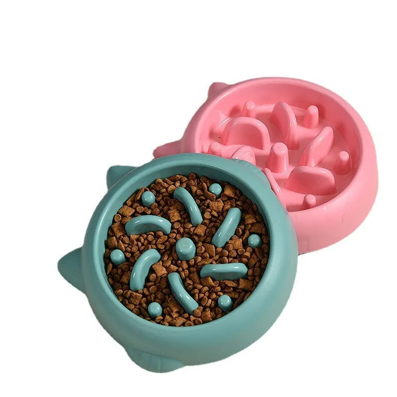 Green bone-shaped slow feeder dog bowl with internal ridges for anti-gulping.