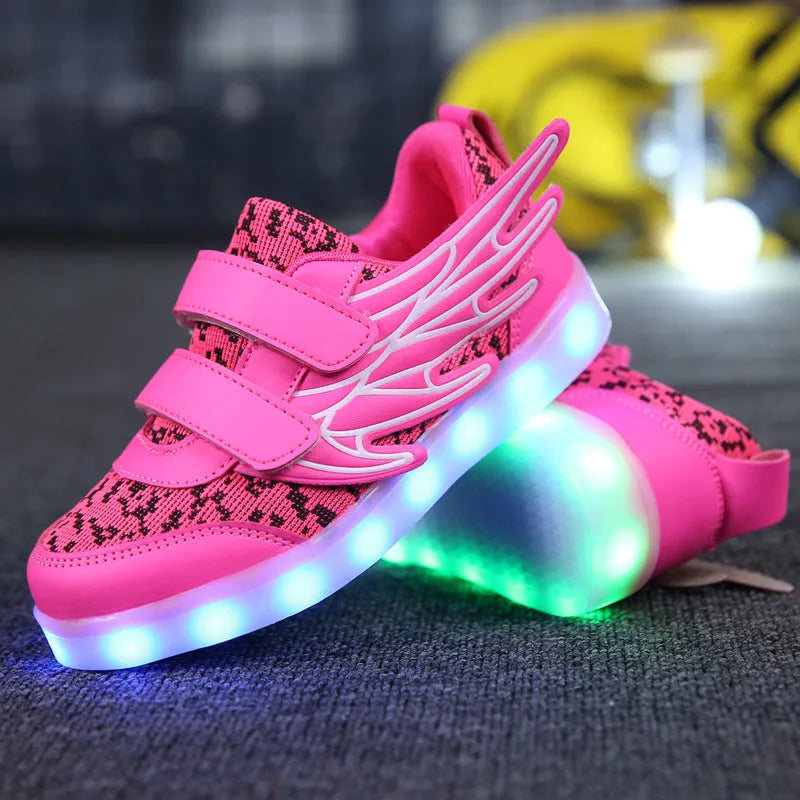 Children's plum red and white LED light-up trainers with colourful wing designs and USB charging port.