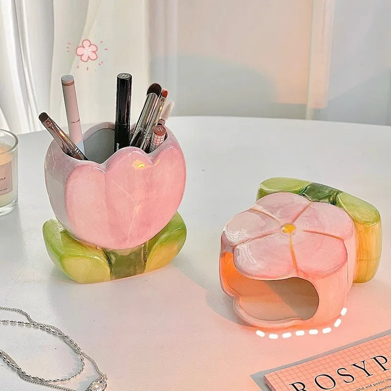 Ceramic pen holder storage box with floral pattern decoration on desktop