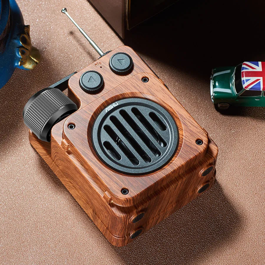 Retro lightweight compact wireless Bluetooth speaker in Rosewood Gold with plastic shell