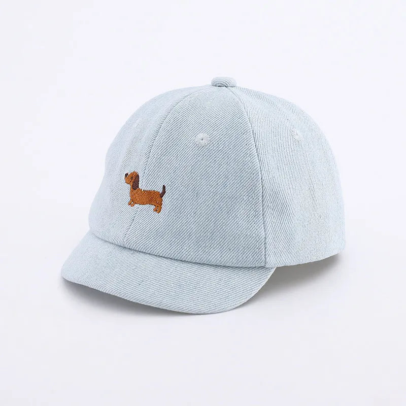 Denim puppy print baseball cap for babies with dome crown and short brim in black, dark blue, or light blue
