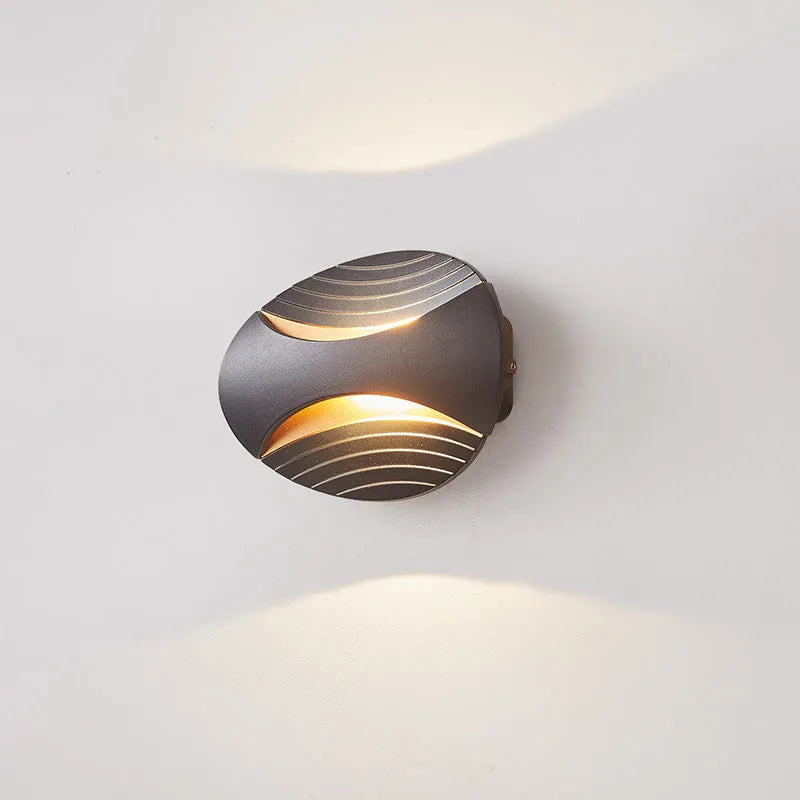 Modern minimalist aluminium wall lamp with IP65 rating, shown in black gold finish.