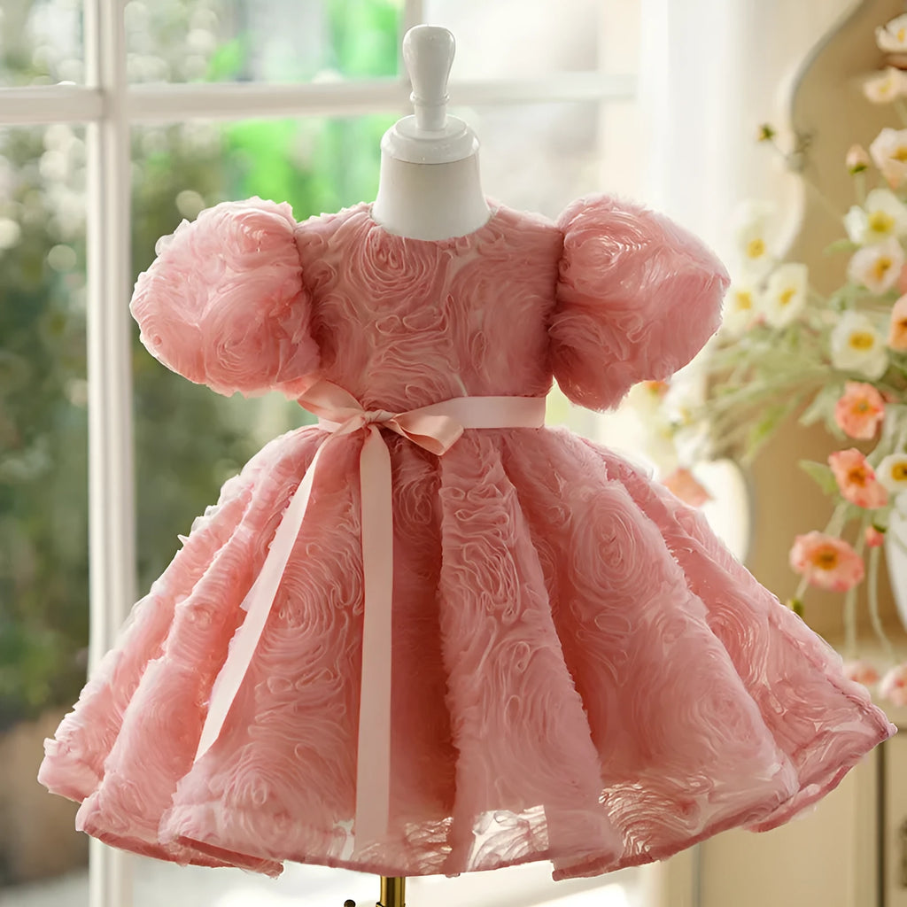 Children's girls birthday pettiskirt in bean pink with layered polyester design, front view