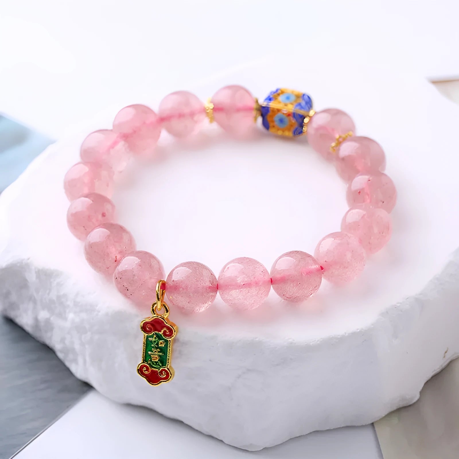 Pink Strawberry Quartz crystal bracelet with hand-woven construction and lucky national style design