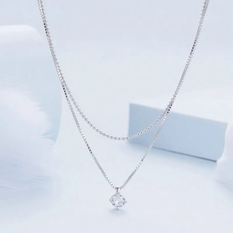 Women's double-layer sterling silver necklace with pearl chain and personality pendant
