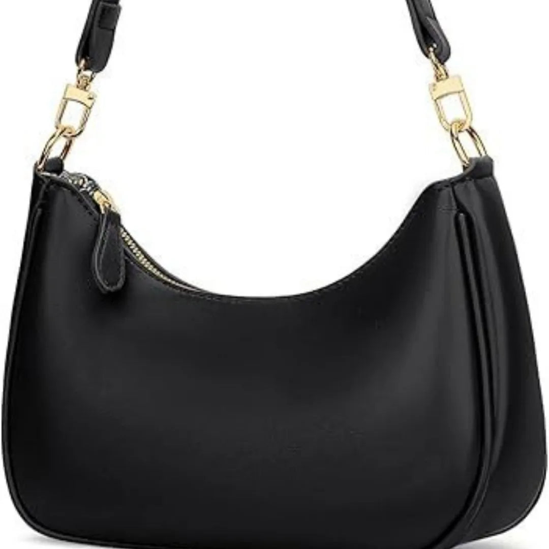 Black women's retro PU shoulder bag with horizontal square shape and sewing thread detailing on plain background