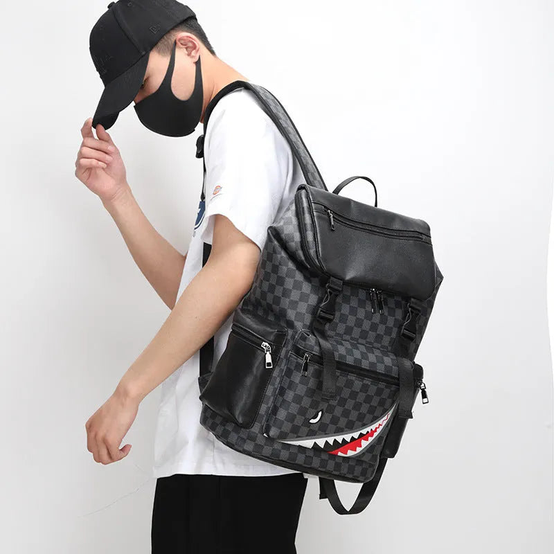 Korean casual checkered printed large backpack in PU leather with curved shoulder straps.