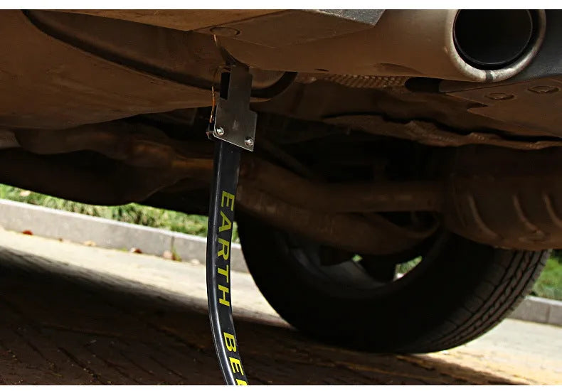 Black rubber vehicle electrostatic grounding strap, 37cm long, for preventing static shocks on cars and vans.