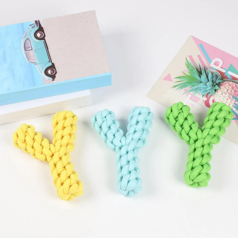 Blue Y-shaped cotton rope dog toy for large breeds on a wooden floor.