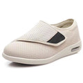 Beige leisure shoes with a velcro strap, textile and synthetic leather upper, and a rubber sole.