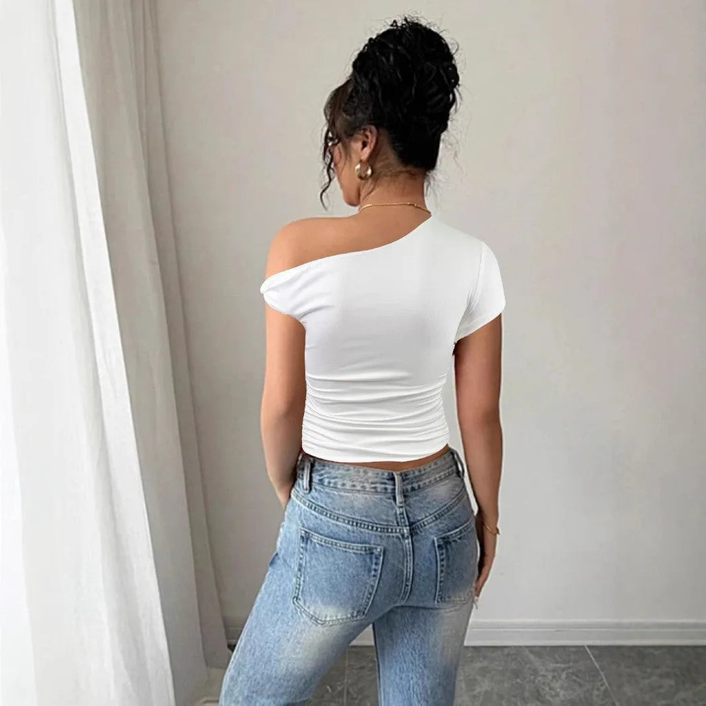Women's white polyester slim fit pullover top with oblique shoulder neckline and raglan sleeves