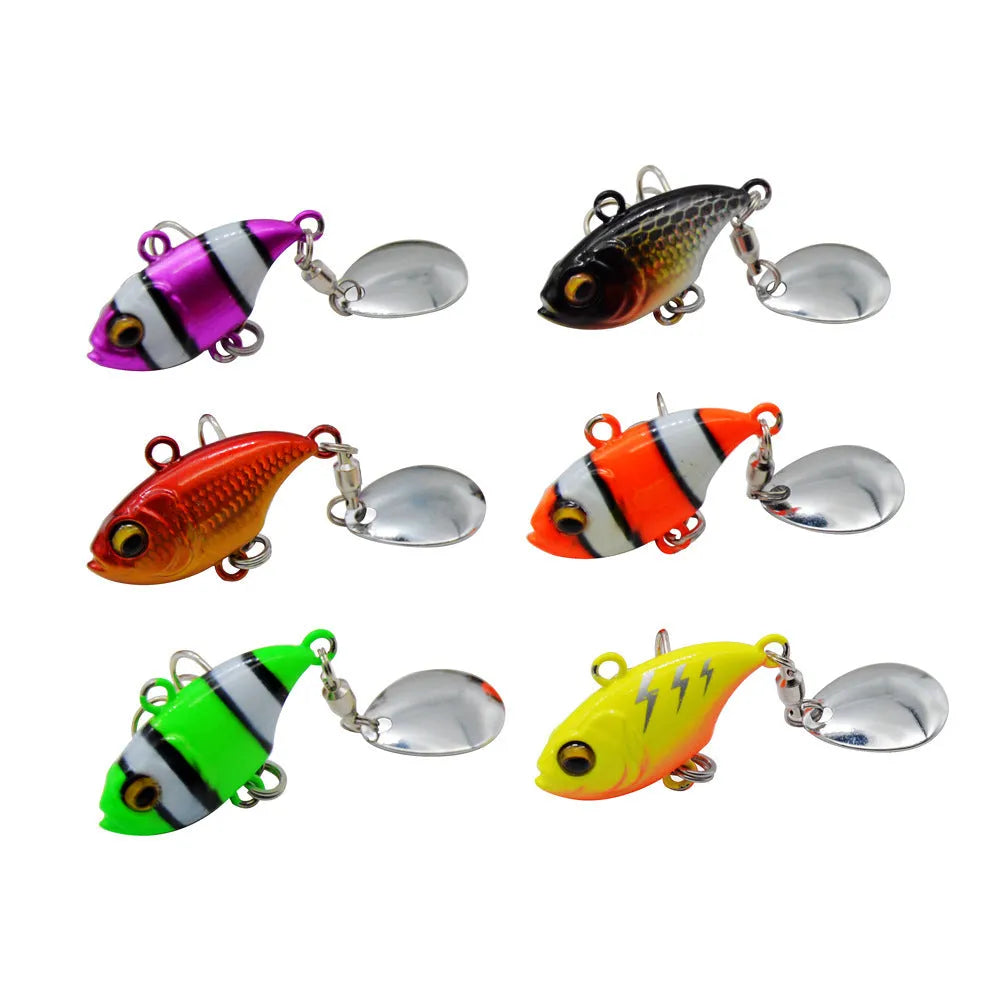 Metal fishing lure with a rotating sequin plate in zebra stripe orange colour.